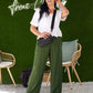 woman wearing wide shirred elastic waistband lounge pants with side pockets in olive