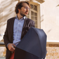man with a Anatole Colette Collapsible Micro Umbrella