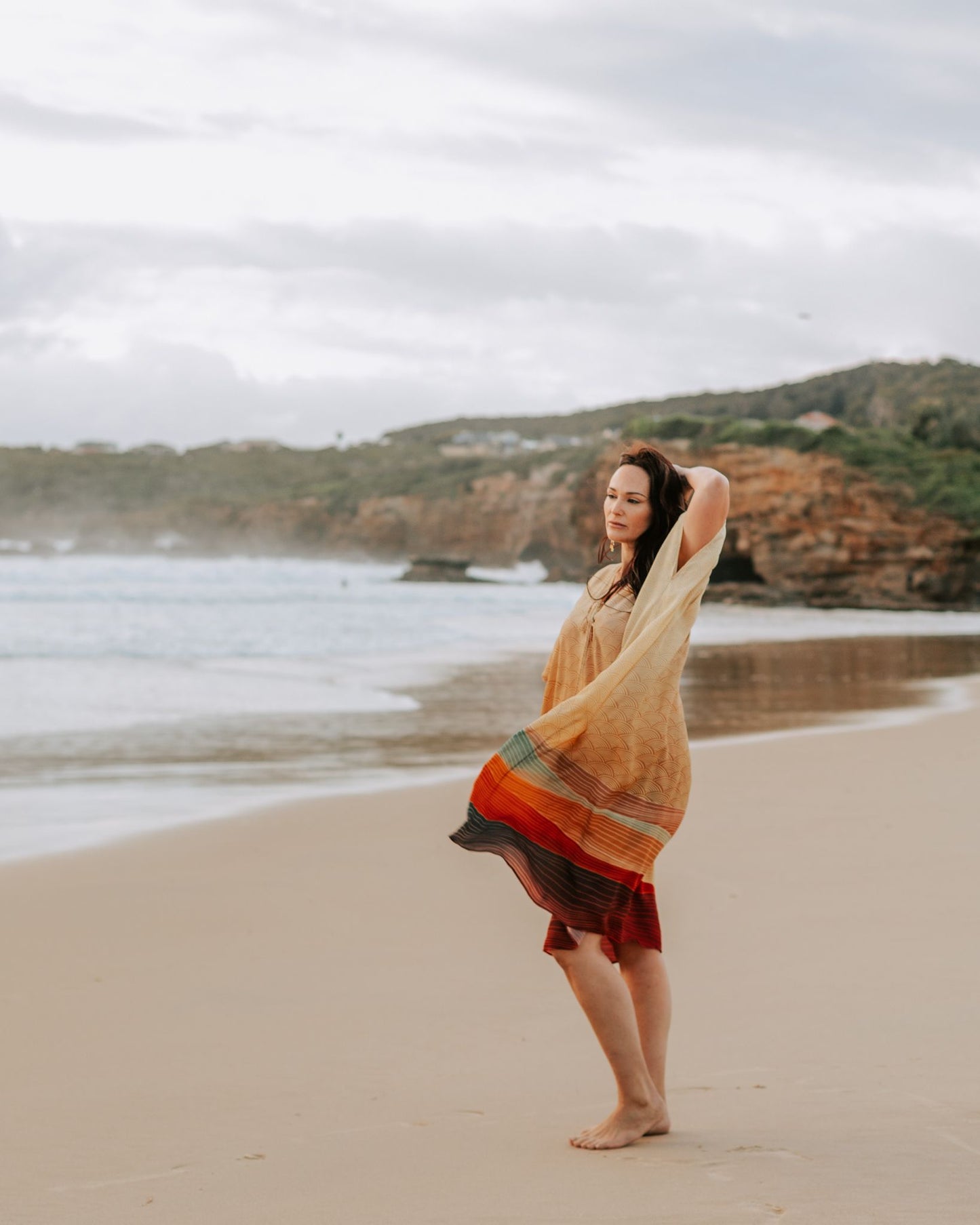 woman on the beach wearing Amera Eid Kaftan - Layali Design