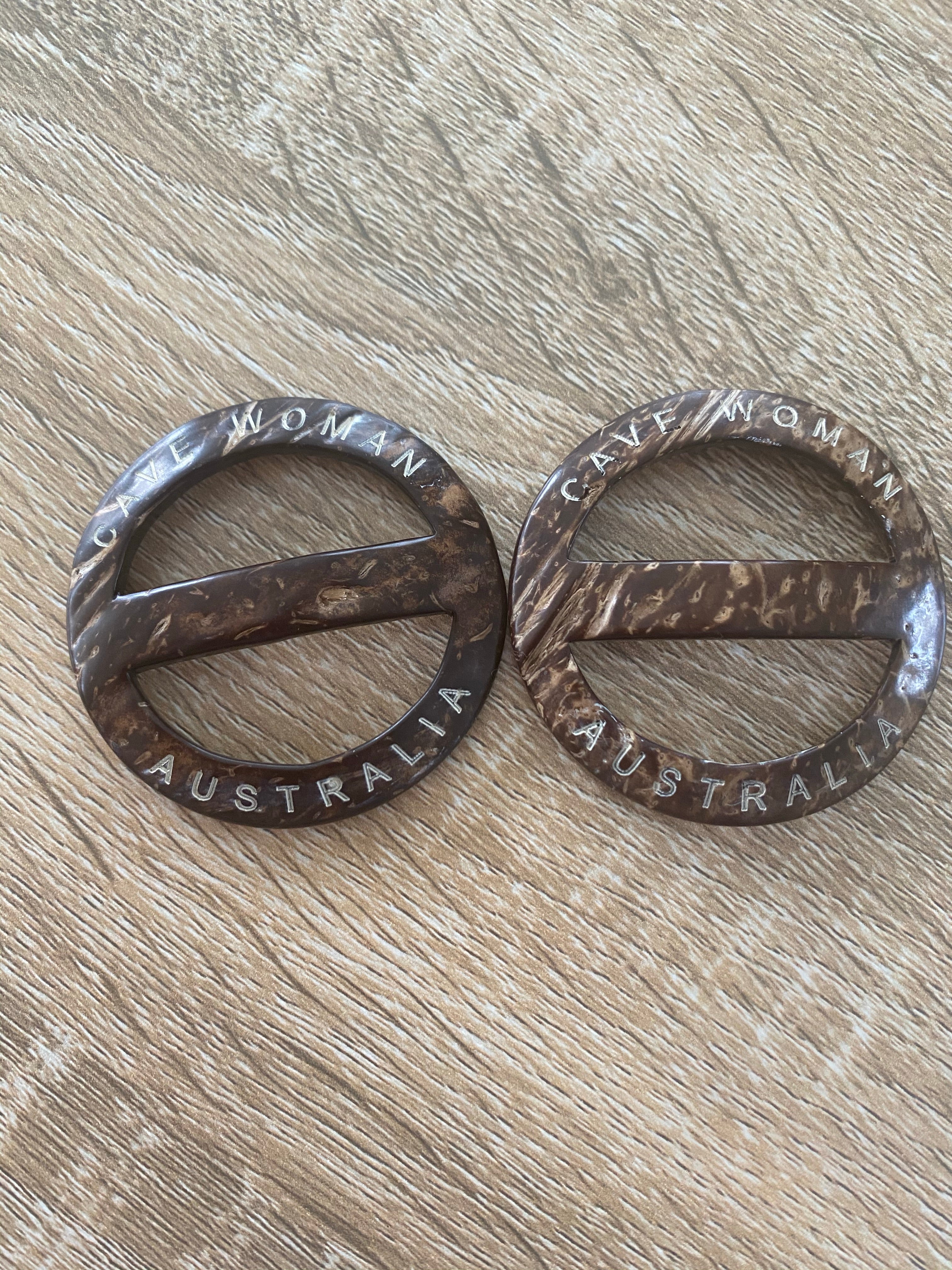 Cave woman coconut belt buckle