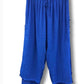 3/4 length loose capri trousers with tie on waist in blue color with three buttons on the side