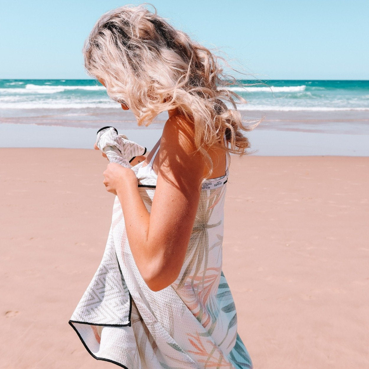 woman at the beach Sand Free Towel - The Whitehaven Fan Palm Leaf