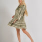 woman wearing aztec pattern bell sleeve tiered dress with floral embroidery - white and sage