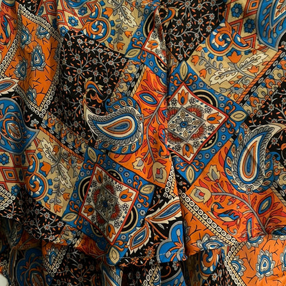 paisley print silk fabric in blue and orange