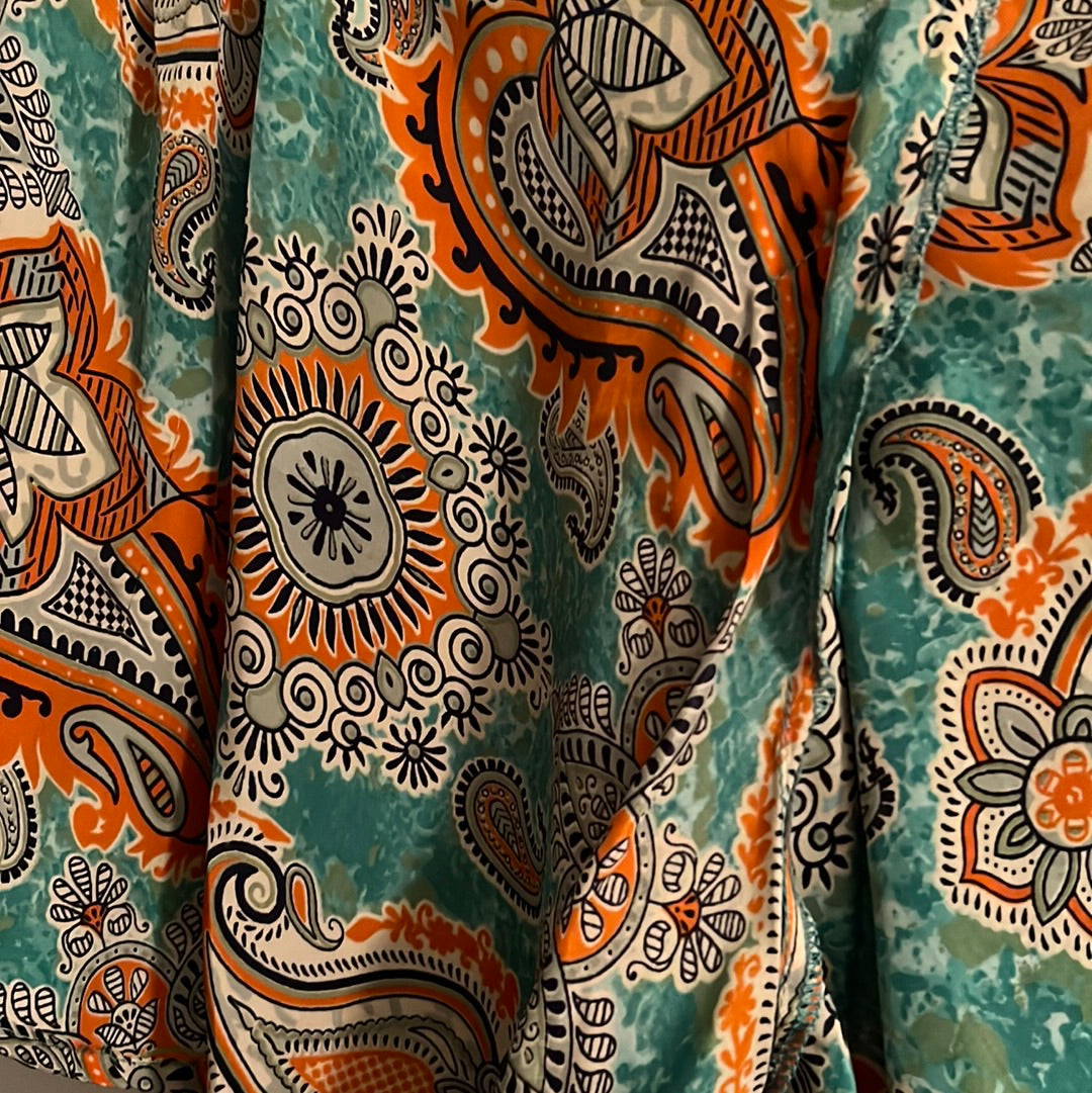 paisley print silk fabric in orange and sage