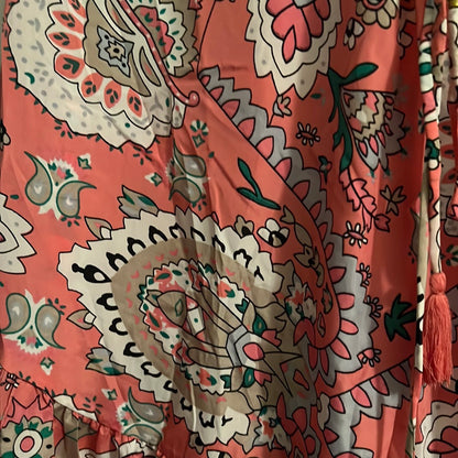 floral print in coral silk fabric