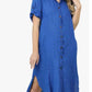 woman wearing  a blue orion linen shirt dress 