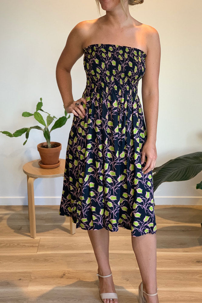 woman wearing strapless smocked dress with tulip pattern 