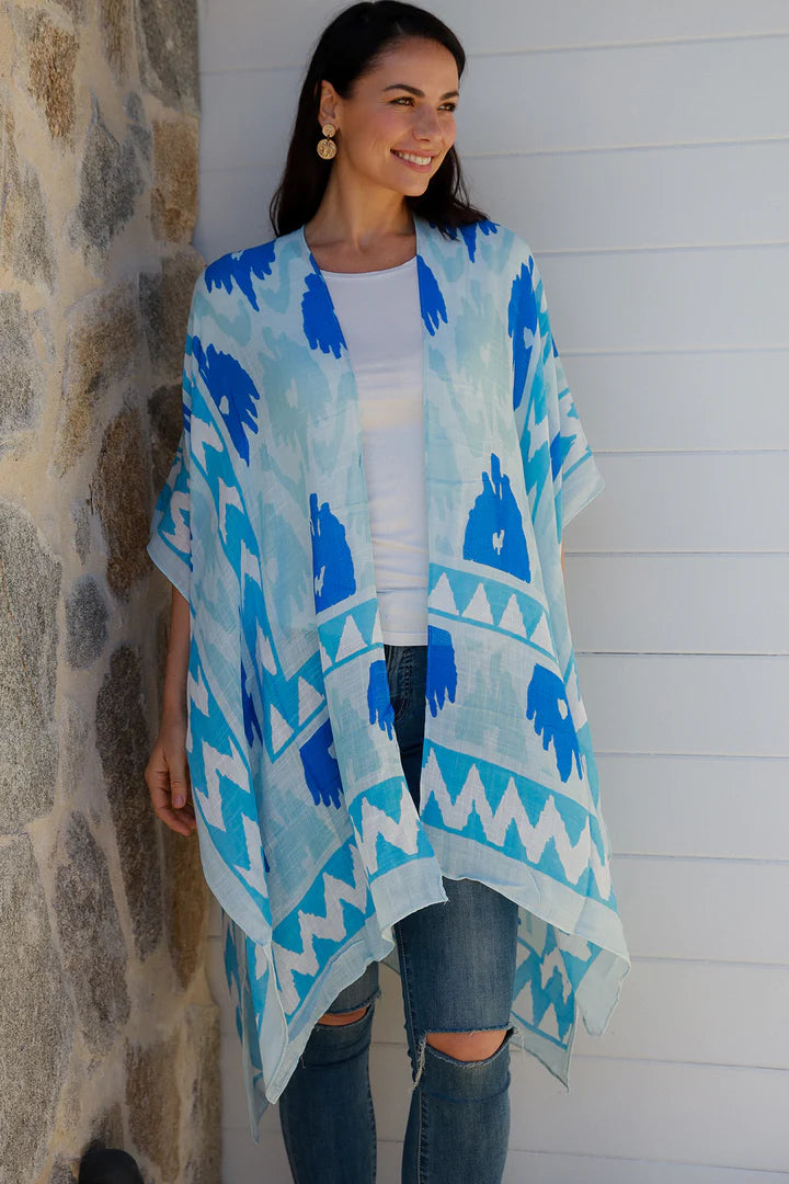 woman wearing a blue ikat print kimono