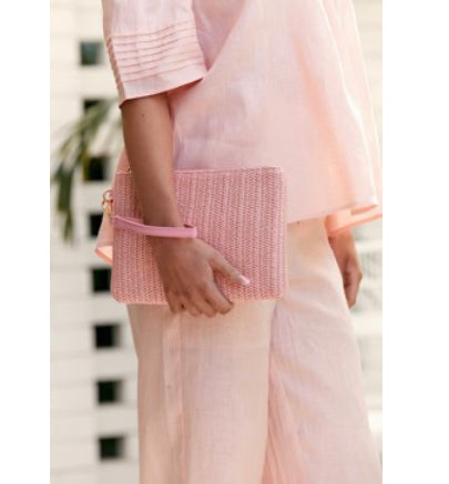 light pink straw clutch bag