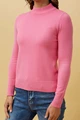 woman wearing a pink Petunia Turtleneck Long-Sleeve Knit Top