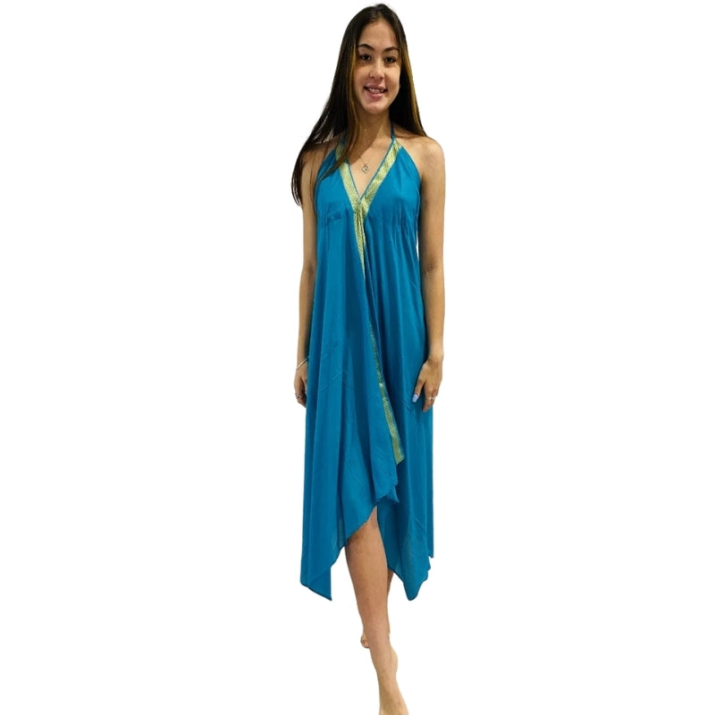 woman wearing halterneck beach dress in blue color with green lining