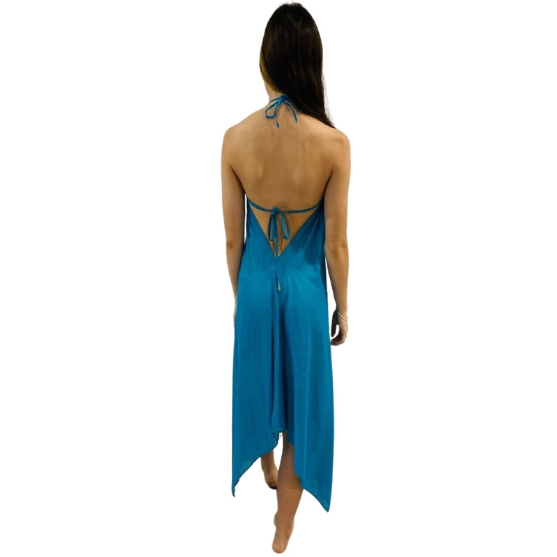 woman wearing halterneck beach dress in blue color with green lining back view
