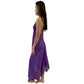 woman wearing halterneck beach dress in purple color with abstract lining side view