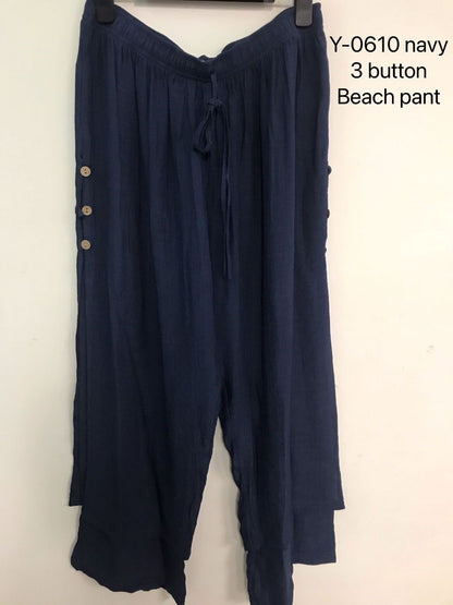 3/4 length loose capri trousers with tie on waist in navy blue color with three buttons on the side