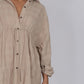 woman wearing a brown Ave The Label drawstring waist Beach Shirt