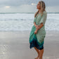 woman on the beach wearing Amera Eid Kaftan - Bahr Design