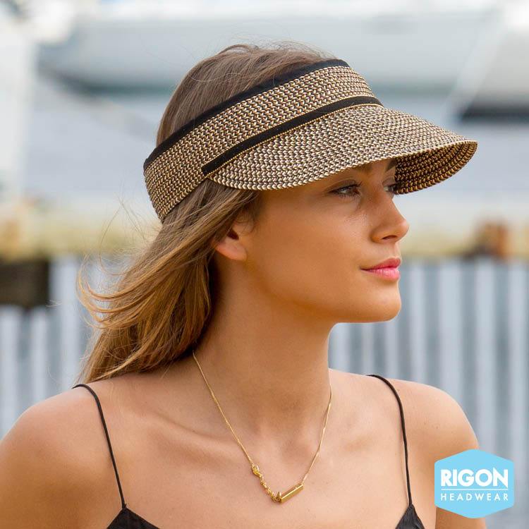 woman wearing natural woven straw visor hat