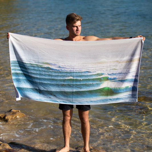  Destination Towels Surfers enjoying the surf on endless lines of waves beach towel