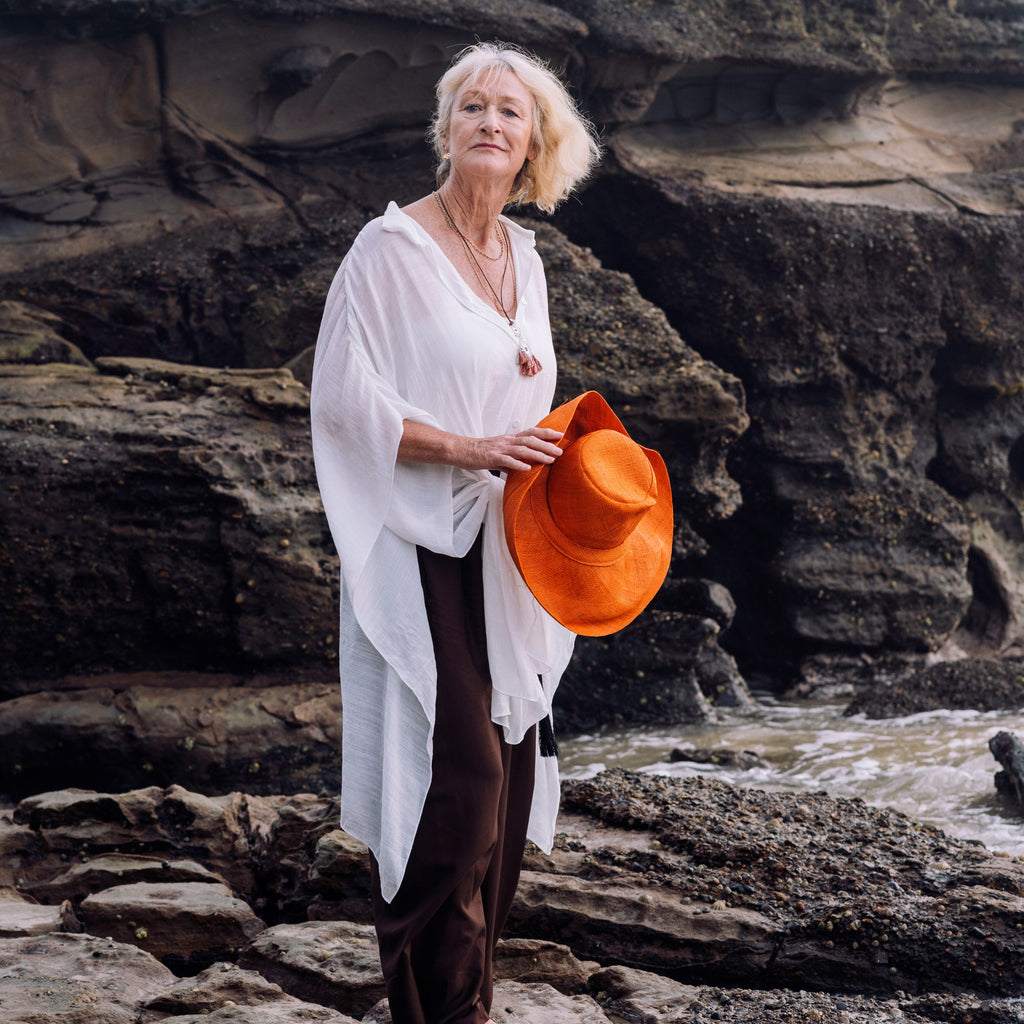 woman on the beach wearing a Wrap Gold thread Beach Pants