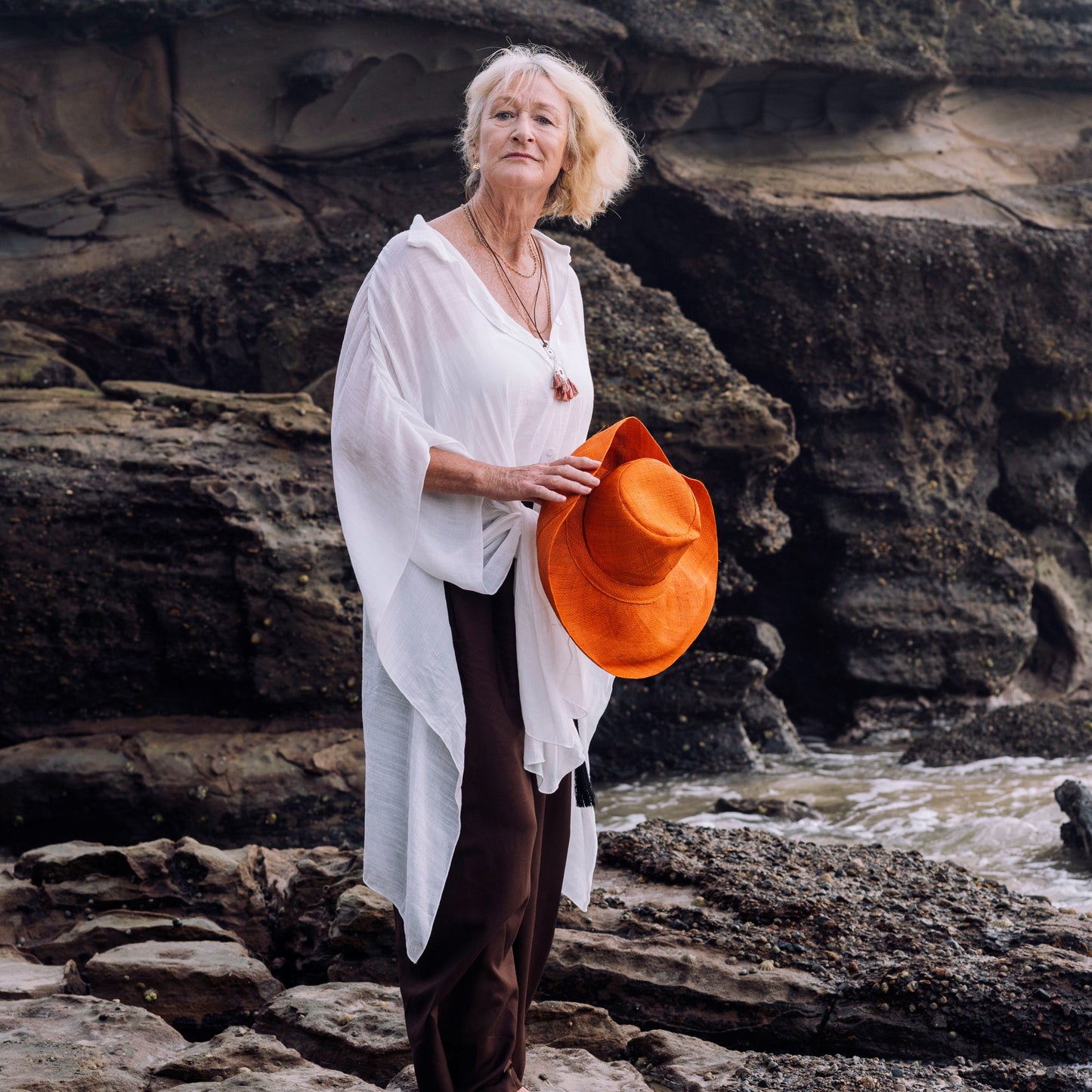 woman on the beach wearing a Wrap Gold thread Beach Pants
