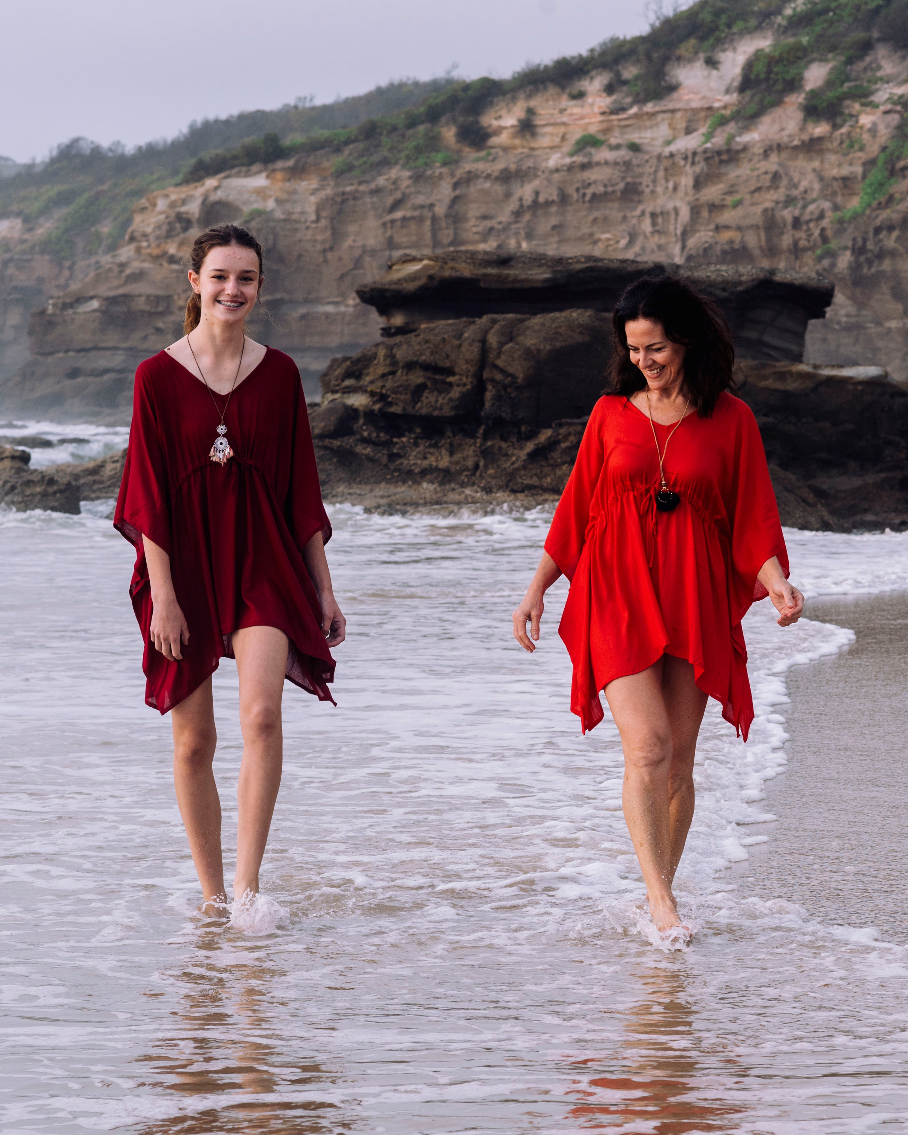Women on the beach wearing V-Neck Beach Kaftan by Cave Woman