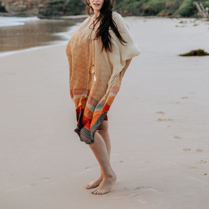 woman on the beach wearing Amera Eid Kaftan - Layali Design