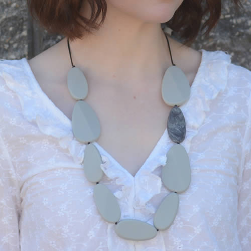 multiple light grey with one marbled flat stone statement necklace