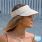 woman wearing melody woven sun visor hat in natural color 
