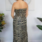 woman wearing a smocked strapless leopard dress back view
