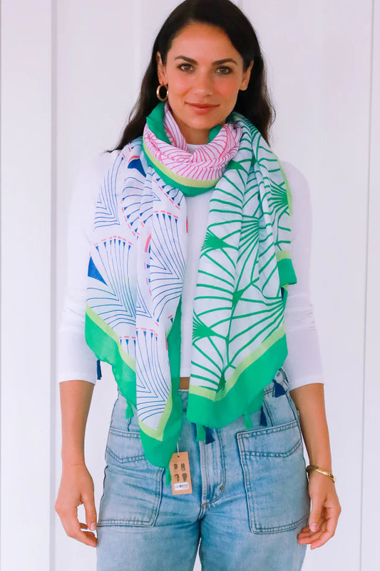 woman wearing white top with Isabella Abstract Green Scarf With Tassels