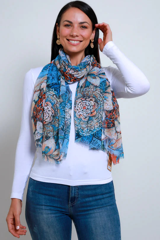 woman wearing a floral print in blue chiffon scarf 