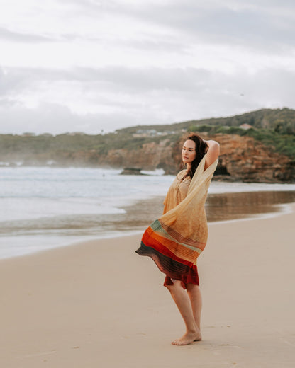 woman on the beach wearing Amera Eid Kaftan - Layali Design