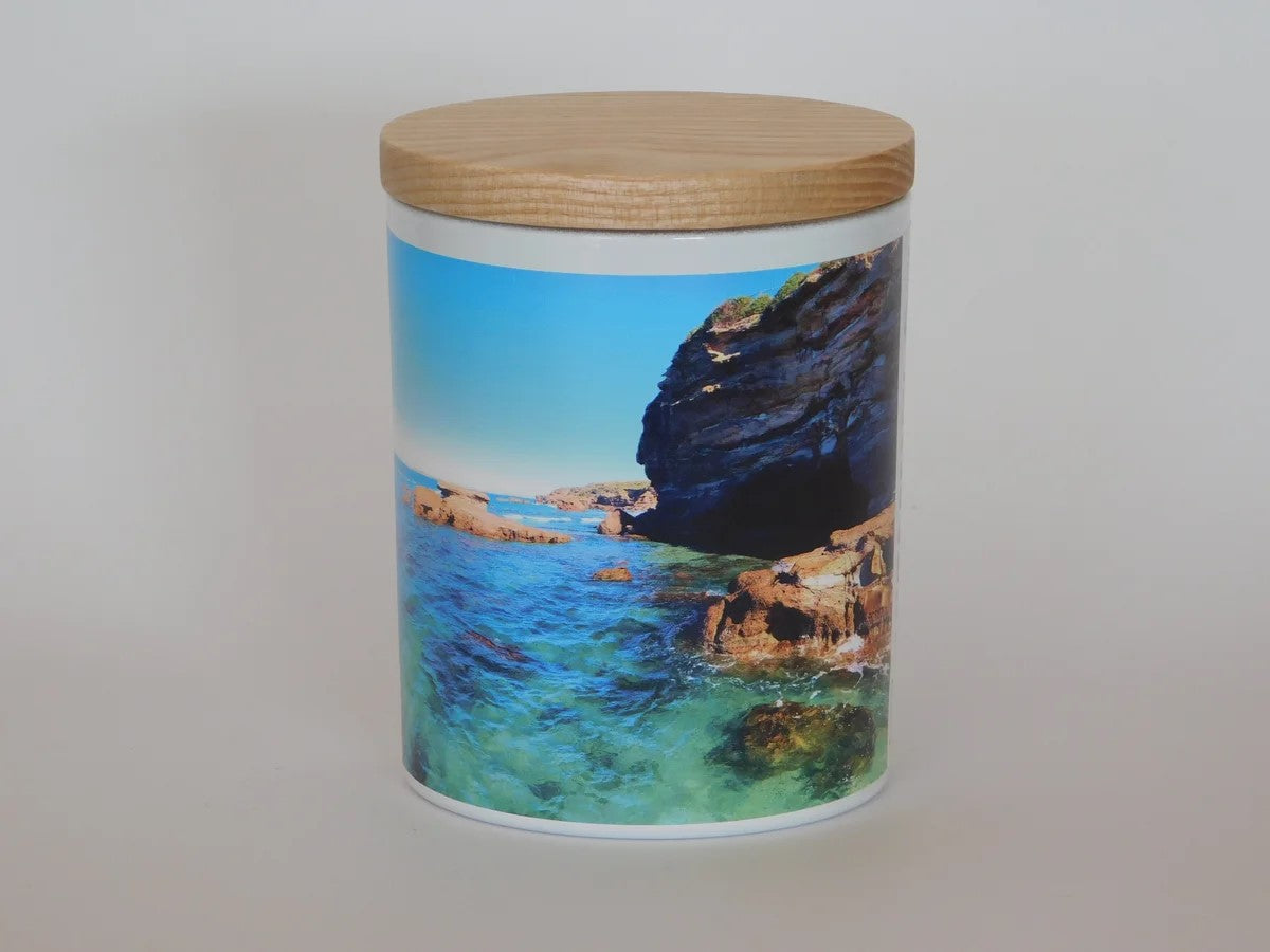 murrays beach candle co. in a glass jar with cover 