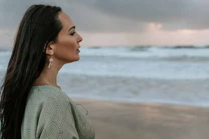 woman at the beach wearing Amera Eid Kaftan - Nazli Design