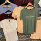 caves beach australia printed t-shirts on a hanger in various colors