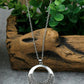 Vine Textured Pendant Necklace on a tree branch