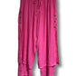 3/4 length loose capri trousers with tie on waist in fuchsia pink color with three buttons on the side