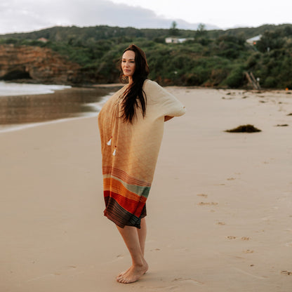 woman on the beach wearing Amera Eid Kaftan - Layali Design